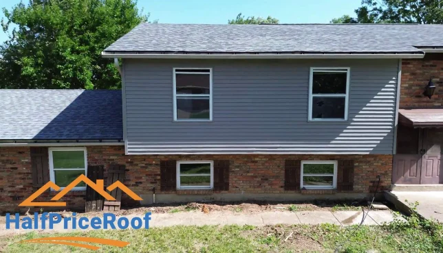 Residential home exterior after roof replacement by Half Price Roof